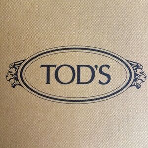 Tods. Like new!!! tennis shoe, worn once. Pink, blue, gray